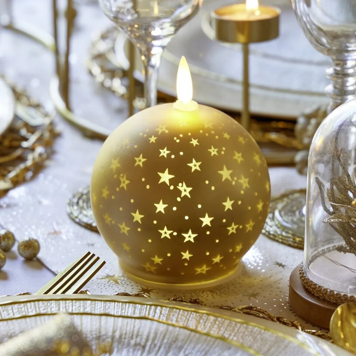 Bougie lumineuse forme boule de Noël en verre doré Ø10xH13cm < Gifi Online
