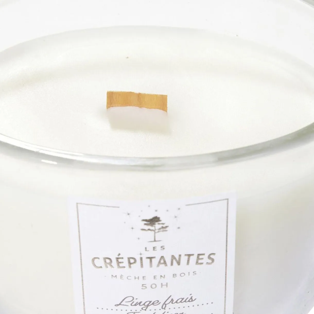 Bougie parfumée blanche Les crépitantes senteur linge frais 50H < Gifi New