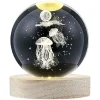 Boule de cristal gravée socle LED thème méduse Ø9xH10cm