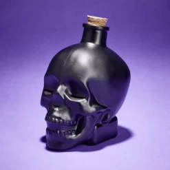 Bouteille poison décoration Halloween crâne en verre noir 10x8,5xH14cm < Gifi