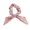 Chouchou en tissu motif fleur avec noeud court Ø7xH4cm (2 modèles) < Gifi New