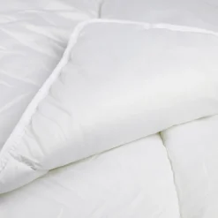 Couette tempérée 1 personne lavable à 95°C polyester blanc 140x200cm