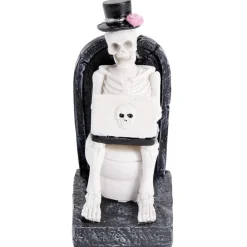Décoration Halloween squelette sur WC résine noir et blanc 6x8xH13cm