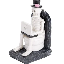 Décoration Halloween squelette sur WC résine noir et blanc 6x8xH13cm