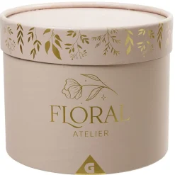 Fleur séchées dans boîte ronde rose doré