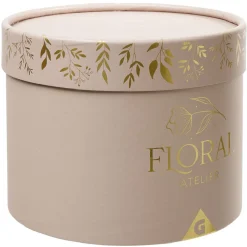 Fleur séchées dans boîte ronde rose doré