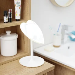 Miroir lumineux LED sur pied inclinable plastique blanc forme coeur 16xH24cm