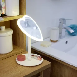 Miroir lumineux LED sur pied inclinable plastique blanc forme coeur 16xH24cm