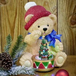 Ourson assis avec sapin de Noël lumineux animé sonore polyrésine 26x26xH34,5cm