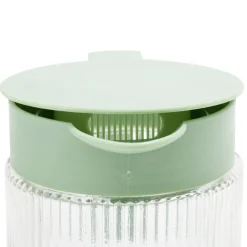 Pichet en verre et plastique vert avec 4 verres
