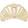 Pince cheveux forme coquillage avec perles métal doré L6cm < Gifi New