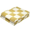 Plaid chenille motif damier bicolore 127x152cm (2 modèles)