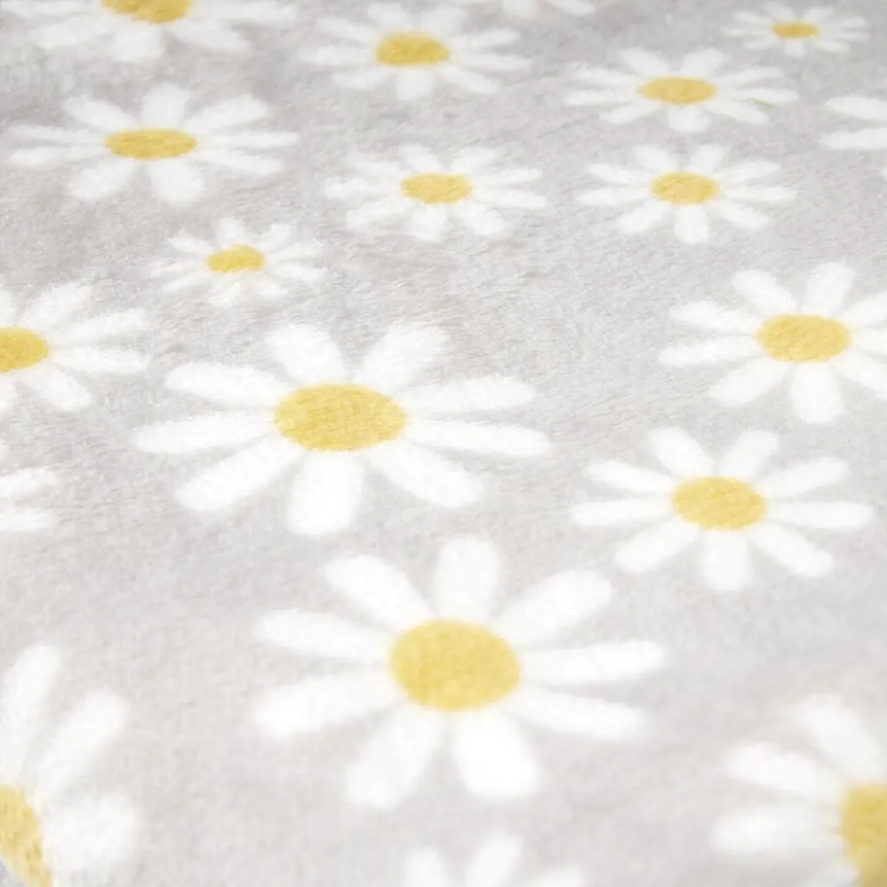 Plaid polaire gris doux motif marguerites 130x160cm