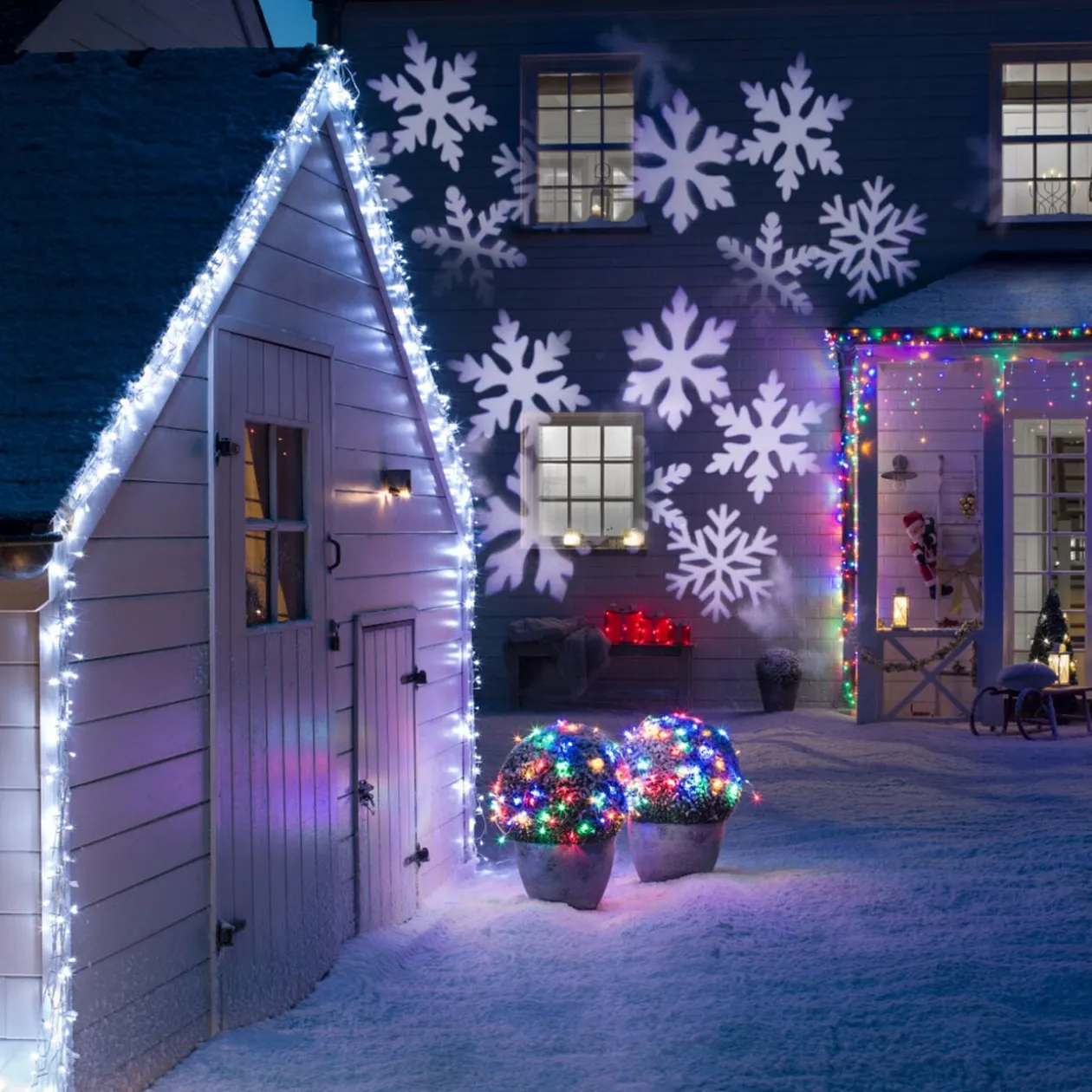 Projecteur extérieur LED Noël motifs flocons animés