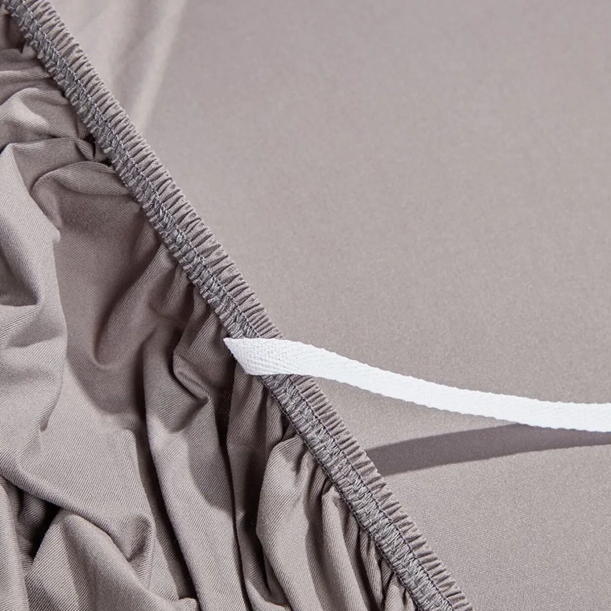 Protège canapé extensible 2 places uni gris 145 à 185 cm < Gifi Best