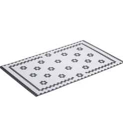 Tapis vinyle rectangulaire motif carreau de ciment fleur blanc et noir 38x60cm