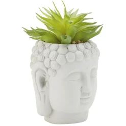 Tête Bouddha avec plante