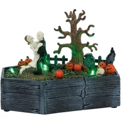 Village animé Halloween cerceuil avec couple squelette dansant H18,5cm
