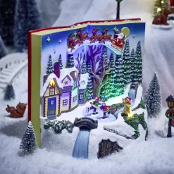 Village animé lumineux sonore façon livre ouvert avec enfants patinoire H20,5cm < Gifi Hot